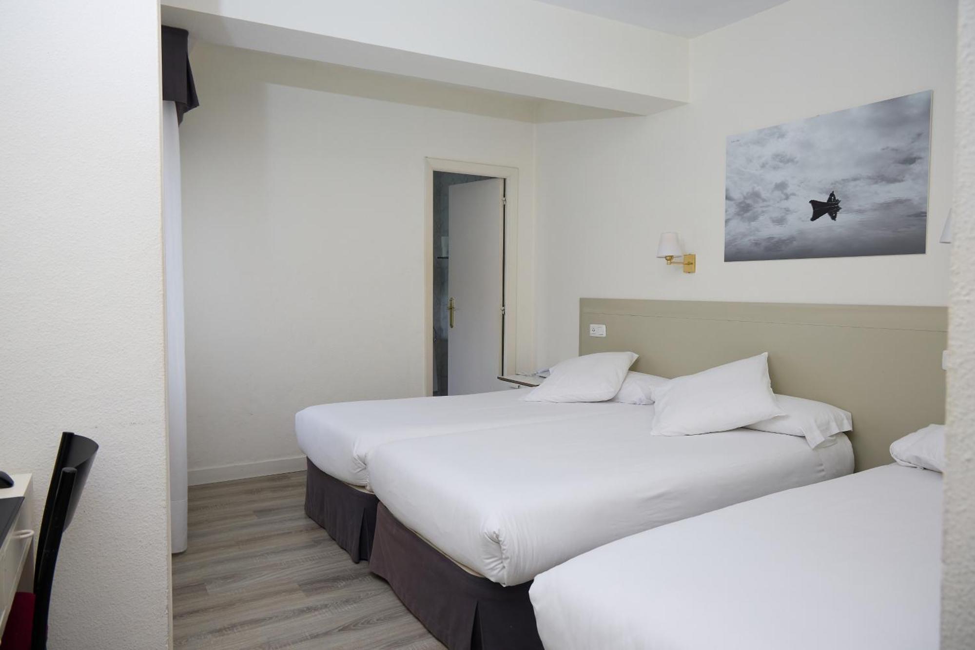 Camera Doppia con Letti Singoli con Letto Supplementare